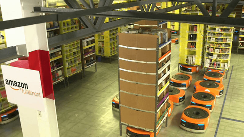 Kiva robots in an Amazon Kiva robots in an Amazon